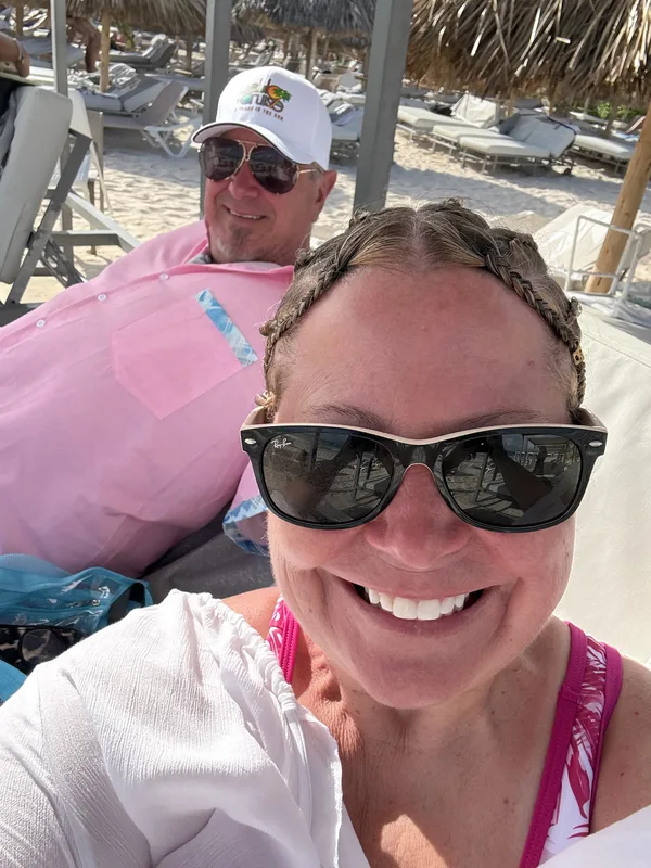 Tracy & Randy relaxing on the beach in Bavaro, Dominican Republic
